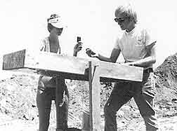 Figure 8.18 Judy Swink (left) and Jim Royle (right) are screening dirt from the first trench and are recovering artifacts for later analysis. Fort Guijarros Museum Foundation Photo Collection.