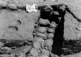 Figure 8.21 The feature is one of twelve layers of cobbles that went into building Strata I, the core wall. It was built inside the fort wall itself and served to strengthen the front part of the merlon. Fort Guijarros Museum Foundation Photo Collection, P:81-7278.