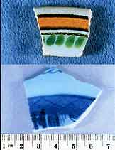 Figure 8.32 Top: This broken piece of an Aranama Polychrome Tradition soup plate is classic early 19th-century Mexican Majolica. The black accent surrounding the orange band and the green interior dots characterize this type as dating from 1800-1835. Bottom: This Chinese Canton Trade Ware serving platter fragment is a style that dates from a Manilla Galleon supply ship in the late 18th century. Both sherds were recovered in an anerobic pond clay deposit with other Spanish artifacts such as cut leather strips, food bone, and Spanish tile. Fort Guijarros Museum Foundation Photo Collection, P:96-3581 and P:95-1770.
