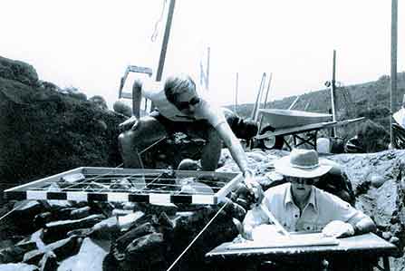 Figure 8.35 Jim Royle on the left shows Charlene Henning where to draw one of the tiles that he had just measured in the grid beneath him. They re-mapped Field I in 1987 so C. Fred Buchanan could apply his architectural code for later analysis and interpretation. Fort Guijarros Museum Foundation Photo Collection, P:87-2540. 